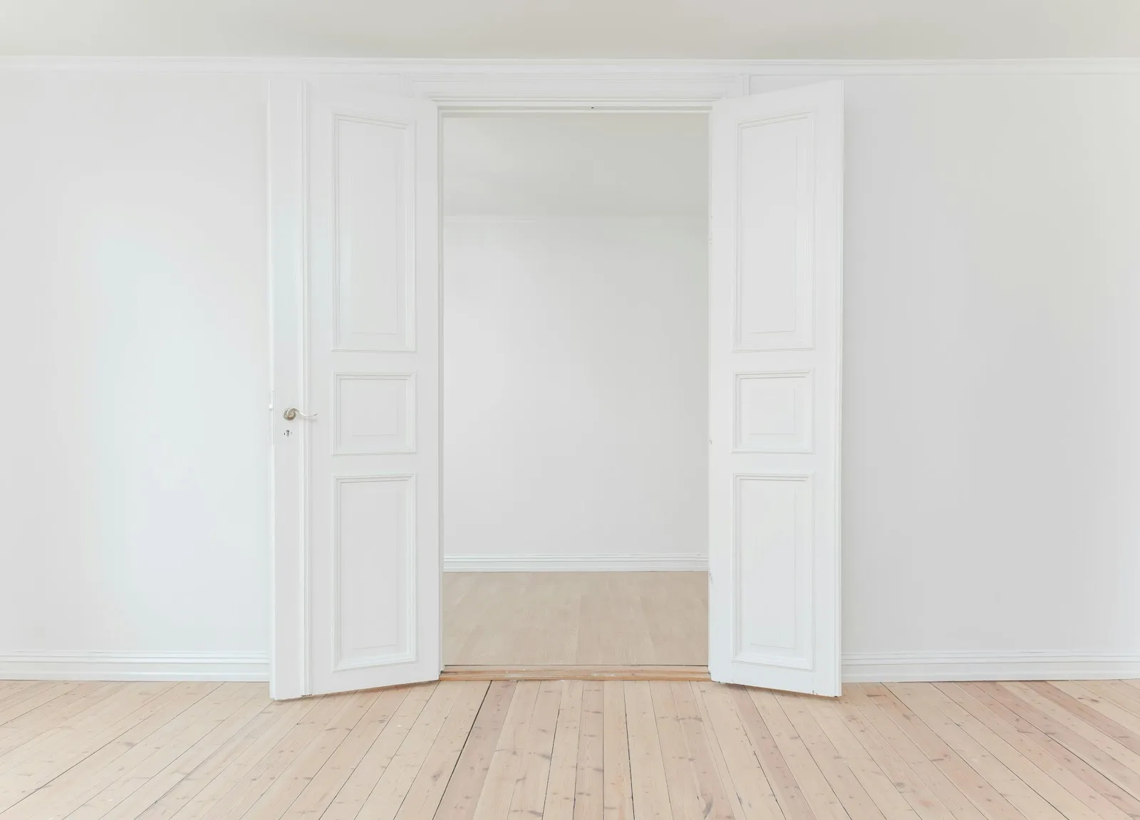 minimalist photography of open door