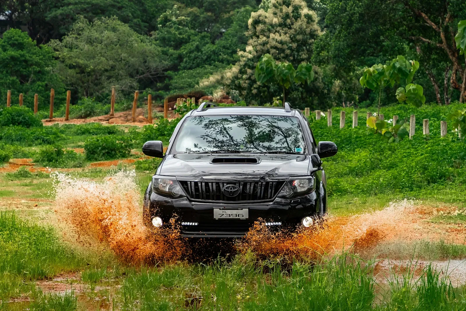 black jeep suv on brown grass field during daytime